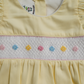 Pastel Smocked Hand embroidered Baby Romper – Yellow Flutter Sleeve with Hair Bow