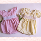 Smocked Baby romper  – Hand Embroidered with Floral Detail. PINK AND YELLOW Variation