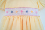 Load image into Gallery viewer, Yellow Smocked and hand embroidered Baby Girl Dress with Bow